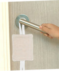Soft, tool-free door silencers cushion every slam, preventing accidental lockouts with quiet, no-hole installation visible on door handle