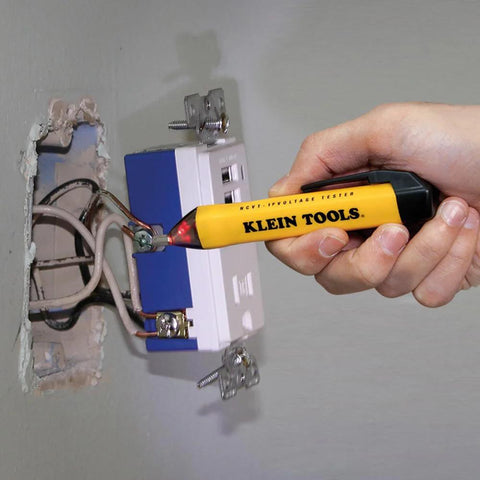 Non Contact Voltage Tester NCVT1P Handheld 50 To 1000 Volt AC Detection used on electrical outlet with LED indicator.
