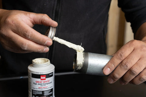 Applying Non Toxic Non Hardening White Pipe Joint Compound For Threaded Joints on metal pipe, 4 oz jar Oatey