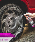 Person using Brake Buster Wheel Cleaner With Non Acid Formula For Safe Use On All Wheels Removes Brake Dust Dirt And Corrosion