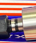 Side view of NUKR47 Track Roller Cam Follower Needle Roller Bearing 20x47x66mm with a black nut on a colored background.