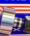 Side view of NUKR52 Track Roller Cam Follower Needle Roller Bearing 20x52x66mm with metal casing on blue background.