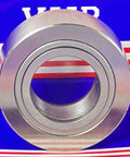 Front view of NURT40 Flat Yoke Roller Bearing 40x80x30mm placed on a striped background.