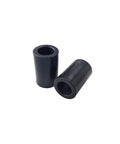 Replacement Axle Pivot Tube Spacer Bushing Nylatron For Husqvarna 532136518 And Craftsman 136518, two black plastic bushings on white background.