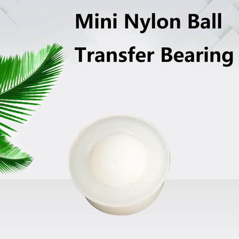 Mini nylon ball transfer bearing with white body for smooth 360-degree rotation use in conveyors and transfer tables.