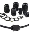 32 Pieces Nylon Cable Gland Kit Waterproof IP68 Adjustable 3 To 18mm With NPT 3/4 NPT 1/2 And PG13.5 PG11 PG9 PG7 Threaded Glands For All Weather Ready Enclosures And Electrical Boxes Black, including various sizes and rubber seals.