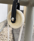 2-1/2-Inch Diameter Nylon Pulley - Durable, Smooth Outdoor Clothesline Pulley for 1/4-Inch Rope, 4 Pack installed on pole