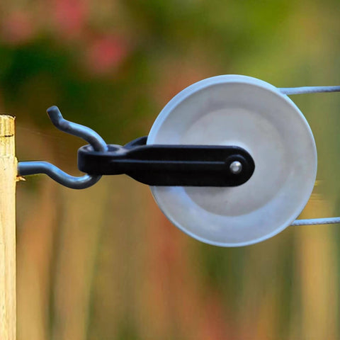 Outdoor installed Nylon Clothesline Pulley 2 inch Diameter Nylon Pulley with metal bracket on a clothesline