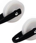Two 2-inch diameter nylon clothesline pulleys, showing front view of nylon and metal construction for outdoor use