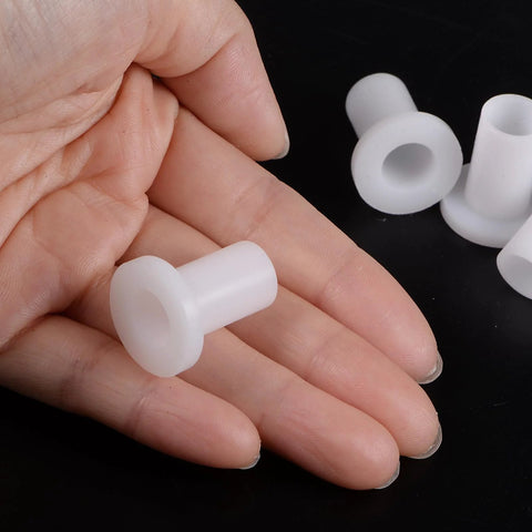 Hand holding 4 Piece Pack Flanged Sleeve Bearings Nylon Bushings White Self Lubricating With High Load Capacity And Wear Resistance 10mm Bore