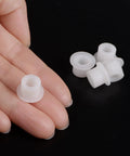Close-up of a 12 Pack Nylon Flanged Sleeve Bearings 6.1mm Bore By 9.9mm OD By 8.3mm Length White Self-Lubricating Bushings for low-friction use.
