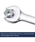 Close-up of 1/4 Inch Nylon Insert Hex Lock Nut on a wrench, carbon steel, white finish. Industrial construction fastener with durable nylon insert.