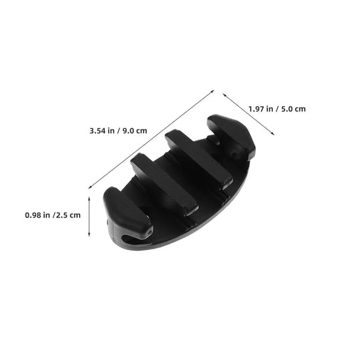 Close-up of black nylon deck-mount boat rope cleat with four prongs.