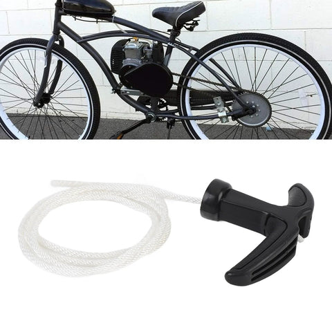 Heavy Duty Nylon Starter Rope And Handle With Comfortable Grip For 2 Stroke Engines shown beside motorized bicycle