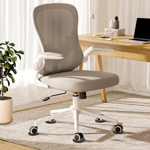 Office chair on 4 Pack 3x3 Inch Furniture Stopper Cups, Premium Solid Rubber Wheel Stoppers, protecting hardwood floor from scratches.