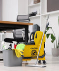 Office with mop bucket and cleaning supplies next to desk featuring Four Piece Mop Bucket Wheel Replacement Set Non Marking TPR Casters.