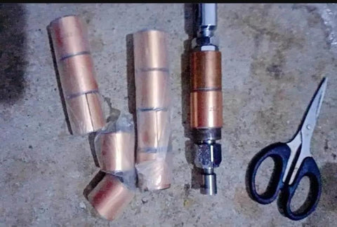 Oilless Bushing Sleeve Bearing 1.25 Inch Bore 1.40 Inch OD 1.17 Inch Length with bronze interlayer and equipment parts visible.