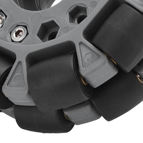 Close-up of Omni Wheel for Robot 100mm 360 Degree Omnidirectional Plastic Wheel showing rubber rollers and brass bearings.