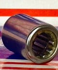 Close-up of RCB061014 One-Way Needle Bearing/Clutch showing inner needle rollers and compact shell design.