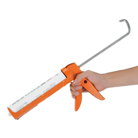 Caulking Gun With Ten To One Thrust Ratio No Drip Design For Precise Bead Control shown in use dispensing material