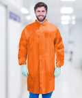 Orange Disposable Lab Coats For Adults 3X-Large Pack Of 10 Pro Grade With Hook And Loop Closure worn by man in lab