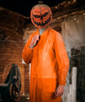 Halloween scene with person wearing Orange Disposable Lab Coats For Adults 3X-Large Pack Of 10 Pro Grade With Hook And Loop Closure.