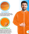 Man wearing Orange Disposable Lab Jackets For Adults Large Pack Of 30 Pro Grade Polypropylene Medical Coats With Elastic Wrists Snap Front And Collar Durable Lightweight Protection From Water And Liquids For Work In Lab And Medical Settings