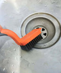 Wire Brush 3Pcs Brass/Stainless Steel/Nylon Wire Brushes cleaning sink, orange rubber handle, close-up on stainless steel bristles