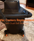 Replacement Casters Set Of 4 For Wet Dry Vacuums, 2 Inch Stem, shown installed on vacuum, orange wheels, 360 degree swivel.