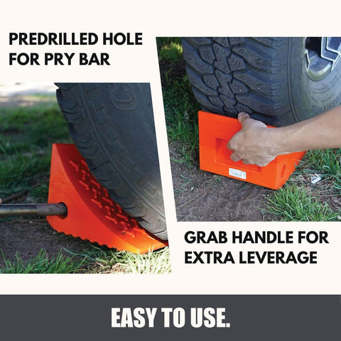 Heavy Duty Wheel Chocks Two Pack That Prevents Movement On Slopes For Boat Trailers RVs Trucks And Campers All Weather Non Slip Solid Rubber With Orange Color By SecurityMan, shown with predrilled hole and grab handle.