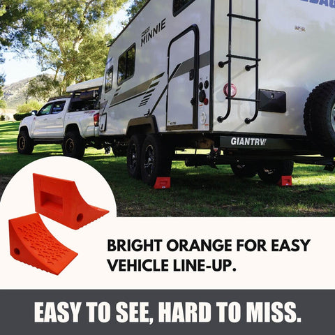 Heavy Duty Wheel Chocks Two Pack That Prevents Movement On Slopes For Boat Trailers RVs Trucks And Campers All Weather Non Slip Solid Rubber With Orange Color By SecurityMan in use with RV