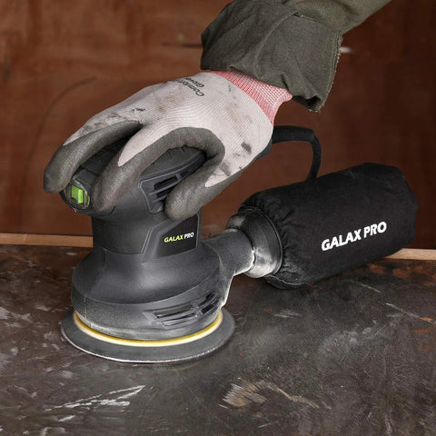 280W Orbital Sander 13000 RPM With Dust Collection And 15 Discs in use on a metal surface, attached dust bag visible
