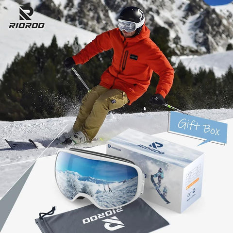 Ski goggles with wide vision, OTG design, and anti-fog UV protection next to skier on snowy slope