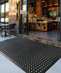 Outdoor Rubber Floor Mat With Drainage Holes Anti Slip Heavy Duty Entrance Mat outside a restaurant entrance