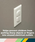 Keep curious hands safe with a 36-pack of removable, reusable electrical outlet covers installed on a wall outlet.