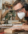 Over Glasses Safety Goggles Anti Fog ANSI Z87 Eye Protection For All worn by man working with wood in workshop