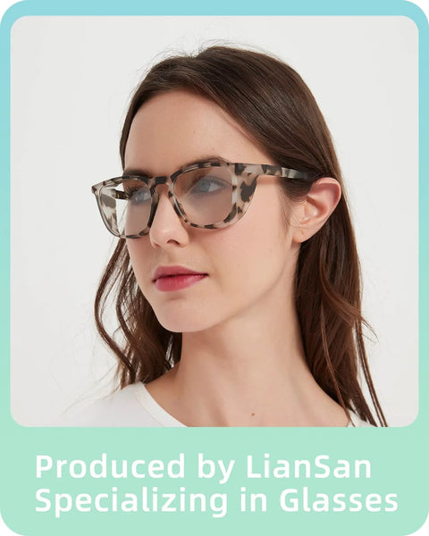 Woman wearing oversized tortoiseshell glasses, front view.