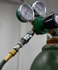 Side view of an Oxy-Fuel Quick Connect Regulator To Hose Coupler Set For Fuel And Oxygen on a gas cylinder