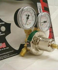 Oxygen Cylinder Regulator With CGA 540 Inlet And 9/16-18RH B Outlet showing dual gauges and brass fittings.