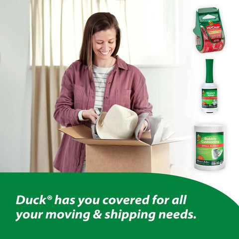 Woman packing box with HD Clear Packing Tape Dispenser Heavy Duty Tape Gun for Boxes Shipping and Moving Includes One Refill Roll Foam Handle displayed.