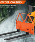 Heavy Duty 46 Inch Pallet Fork Attachment For Tractor Loader And Skid Steer Universal Quick Attach With 2600 Lb Per Fork Load Capacity For Farm Warehouse And Material Handling showing powder coated forks in rain.