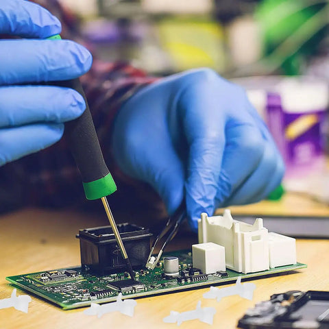 Hands installing 100 Pack Nylon PCB Standoffs With Reverse Locking Snap In Design, Non Conductive Spacers for DIY electronics