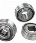 Three W208PPB11 Peer Bearing sealed ball bearings with durable, high-precision support for rotating shafts in industrial machinery.