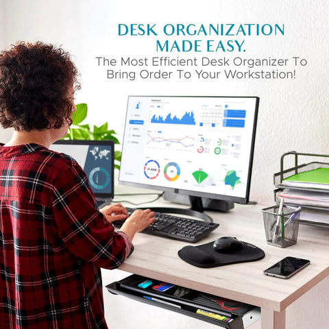 Person working at desk with Pencil Drawer by NYCCO Underdesk Drawer 23 Inch Wide - Ball-Bearing Slides - Black visible below desk.