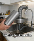 Person holding a durable 304 stainless steel perforated sheet, visible in a kitchen, demonstrating its use for ventilation or filtration.