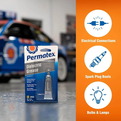 Front view of Permatex 81150 Dielectric Tune-Up Grease, 0.33 oz. Tube, Silver, with packaging in automotive workshop.