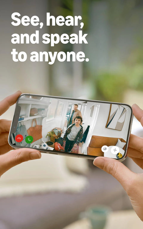 Person holding smartphone showing live view from compact indoor security camera captures crisp 1080p HD video with color night vision.