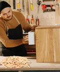 Man installing drawer with Premium Solid Pine Pocket Hole Plugs Pack Of One Hundred Twenty Pieces Three Eighth Inch Diameter For Screw Holes And Pocket Hole Jigs Woodworking For Diyers And Pros With A Smooth Conical Design For A Clean Seamless And Durable Finish on table.