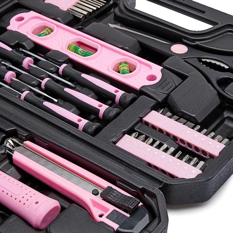 Close-up of Pink 142-Piece Household Tool Kit With Storage Case showing screwdrivers and level for home repairs and DIY projects