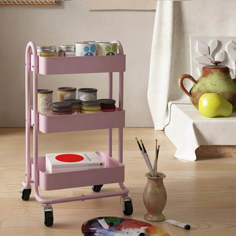 Pink 3 Tier Utility Rolling Cart On Wheels For Kitchen Office Home And Garden Elitehouse Metal Storage Cart With Locking Wheels Durable Mobile Organizer 13.4 By 18.1 By 31 Inches in a room setting with art supplies.